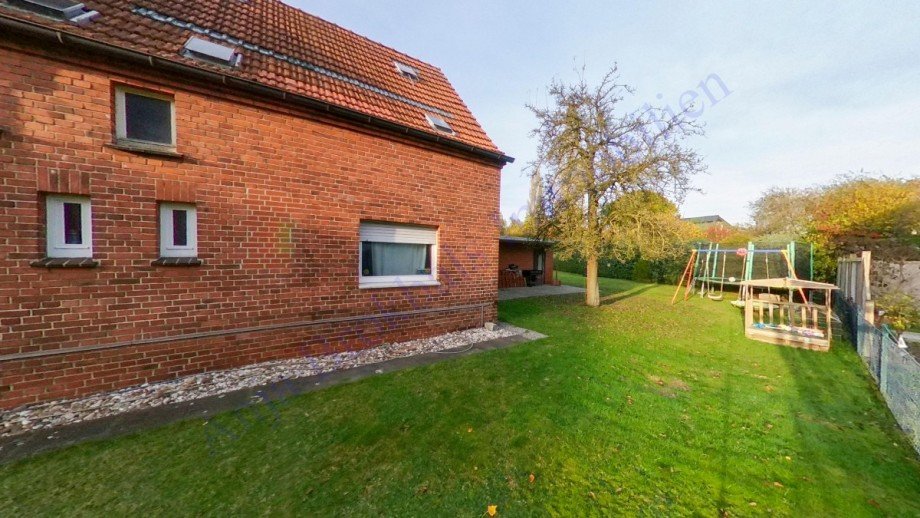Anbau und Seitengarten Einfamilienhaus G�tersloh
