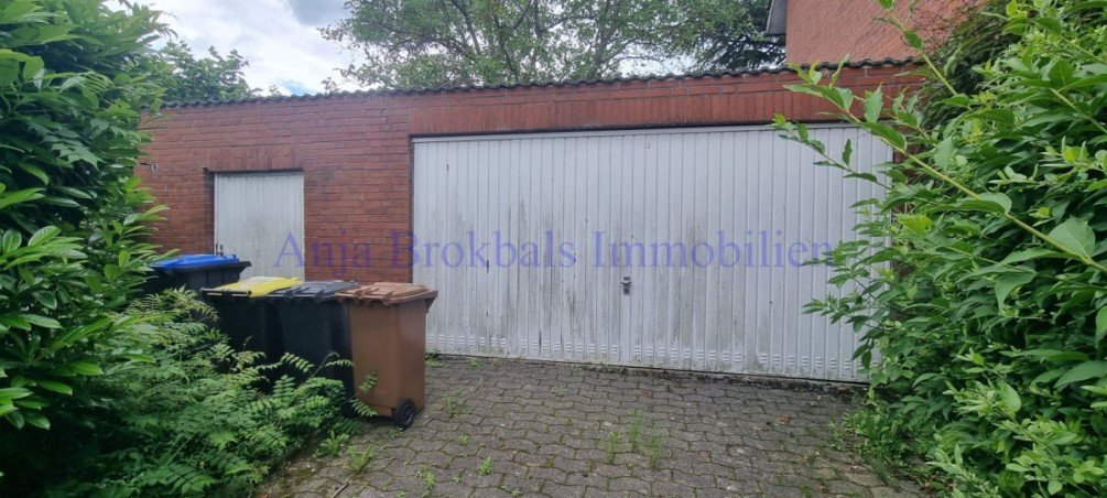 Doppelgarage und Werkstatt / Holzlager Zweifamilienhaus Beckum