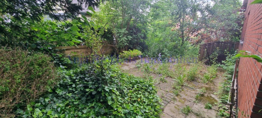 Terrasse Seitengarten Zweifamilienhaus Beckum